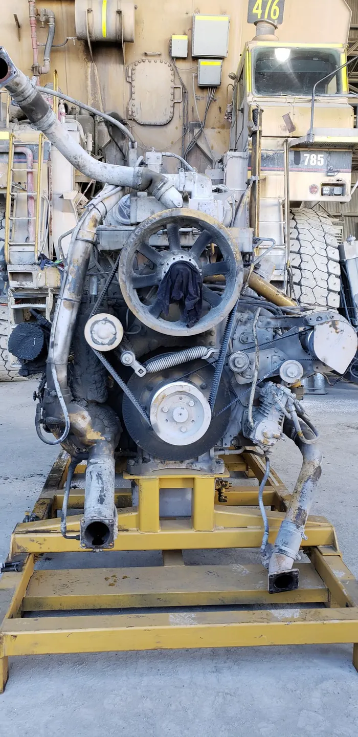 Heavy equipment diesel engine on a stand during repair
